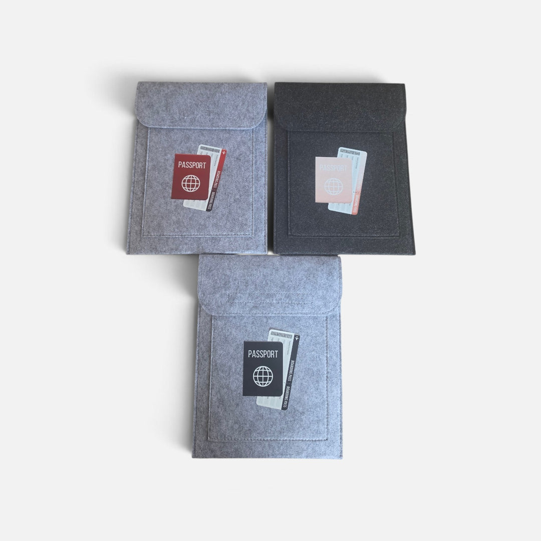 Well Travelled Wallets felt passport holders in light grey, dark grey, and mid-grey with document slots and flap closure